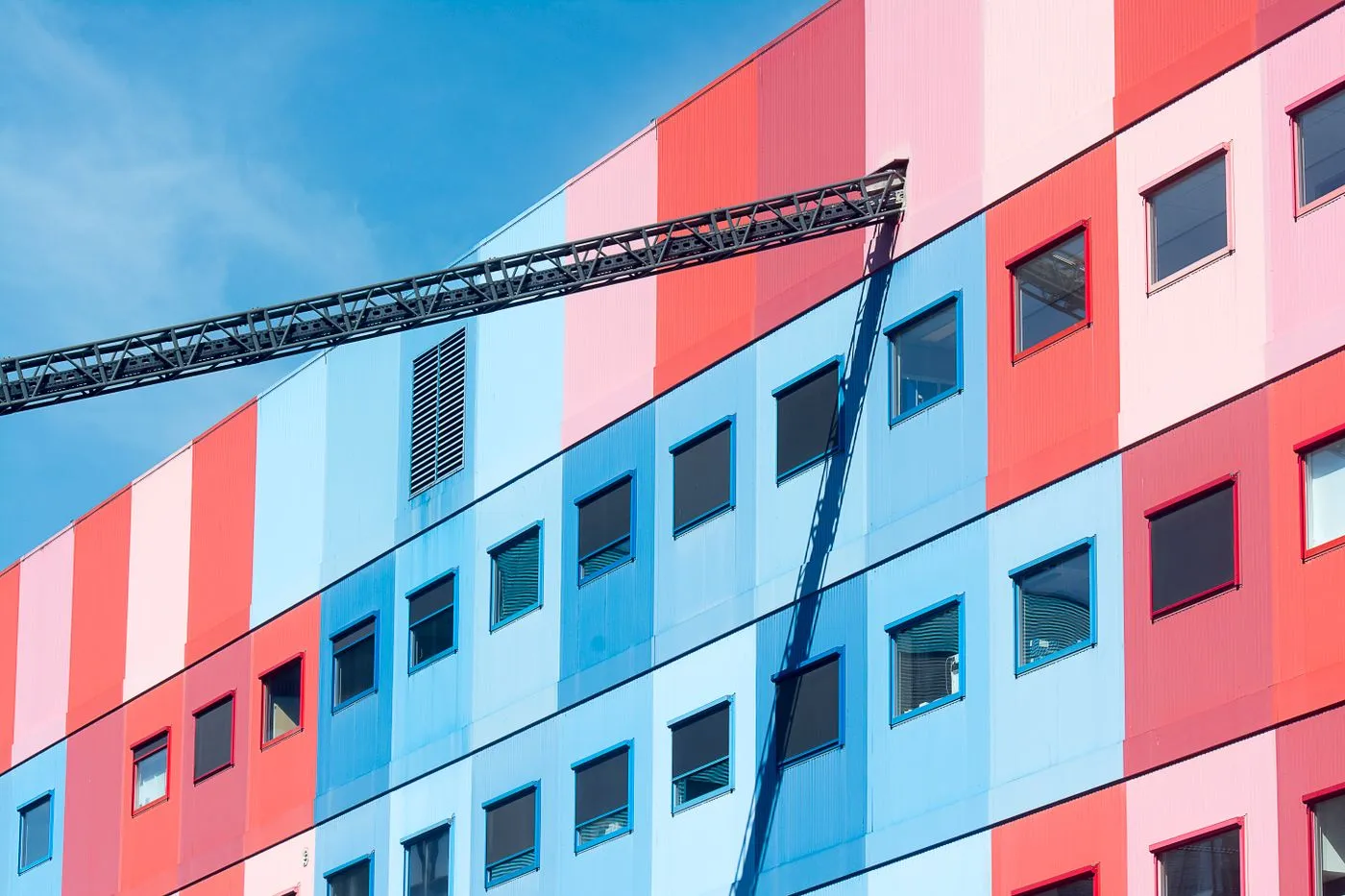 Terracotta architecture framed by a vivid blue sky